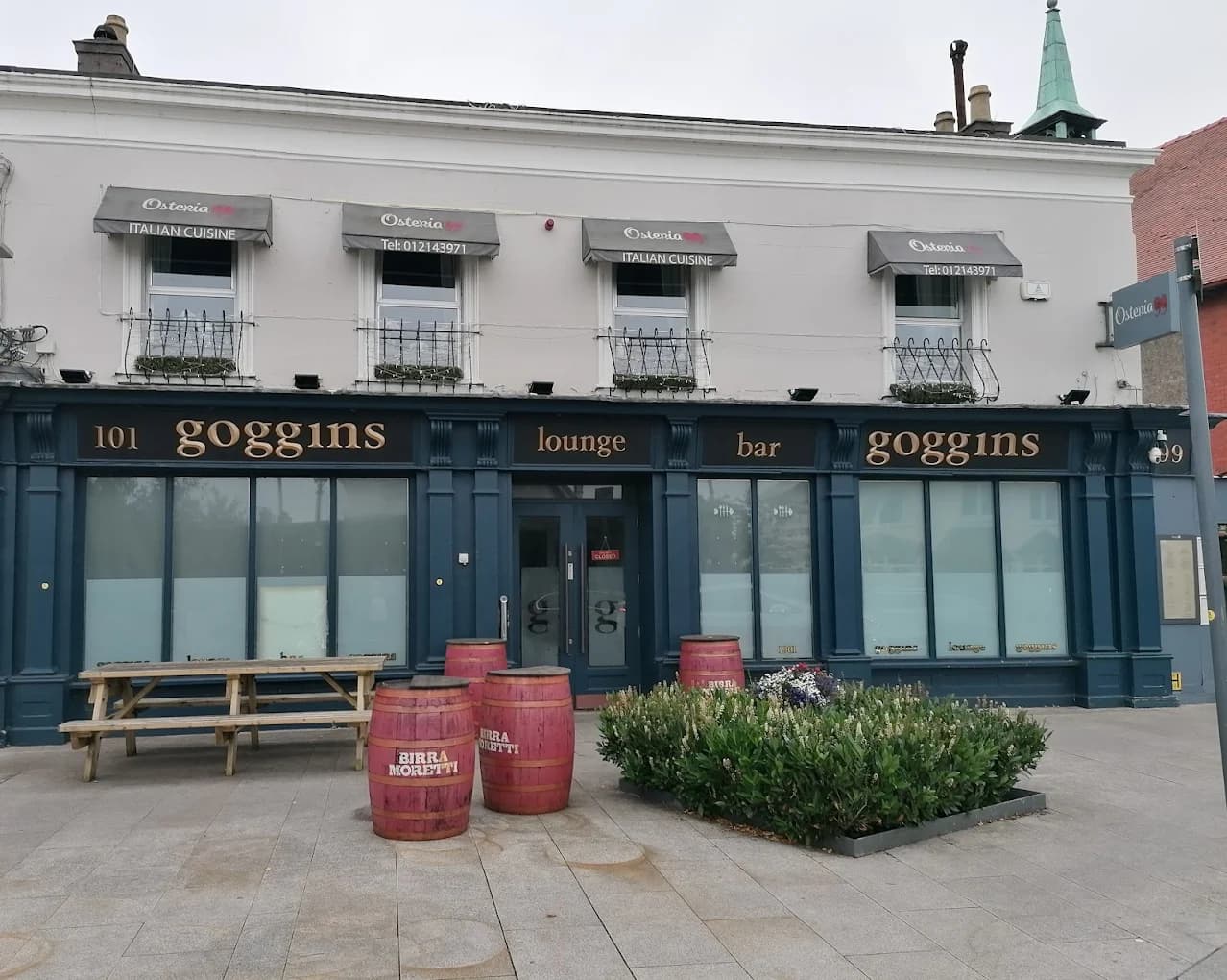 Goggins of Monkstown — classic navy facade with gold lettering on Monkstown Road
